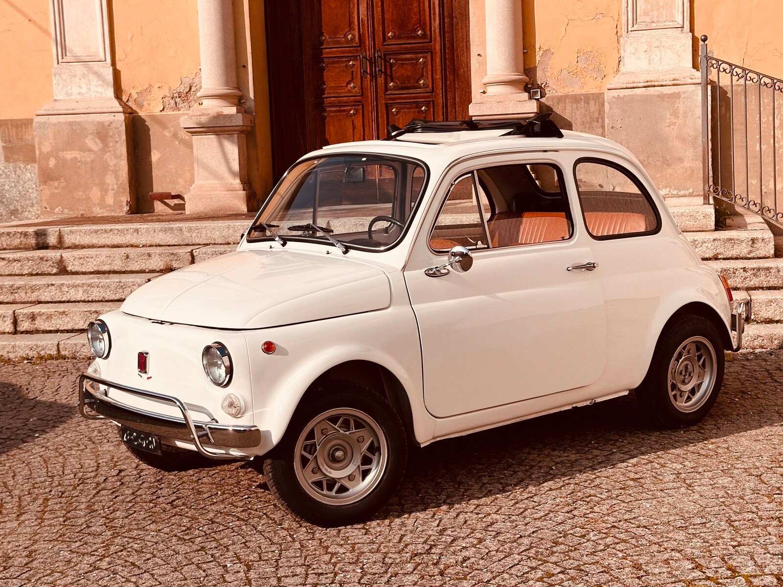Historic FIAT 500 L parked on an Italian street